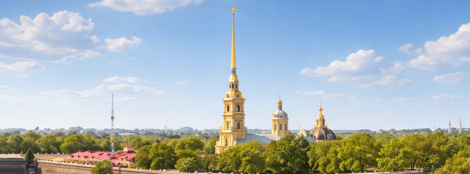 Петропавловская крепость весной: вид на собор и Неву при голубом небе